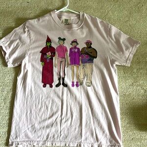 A Gorrilaz band tee worn 2 times. Very cute and bought at the concert venue.